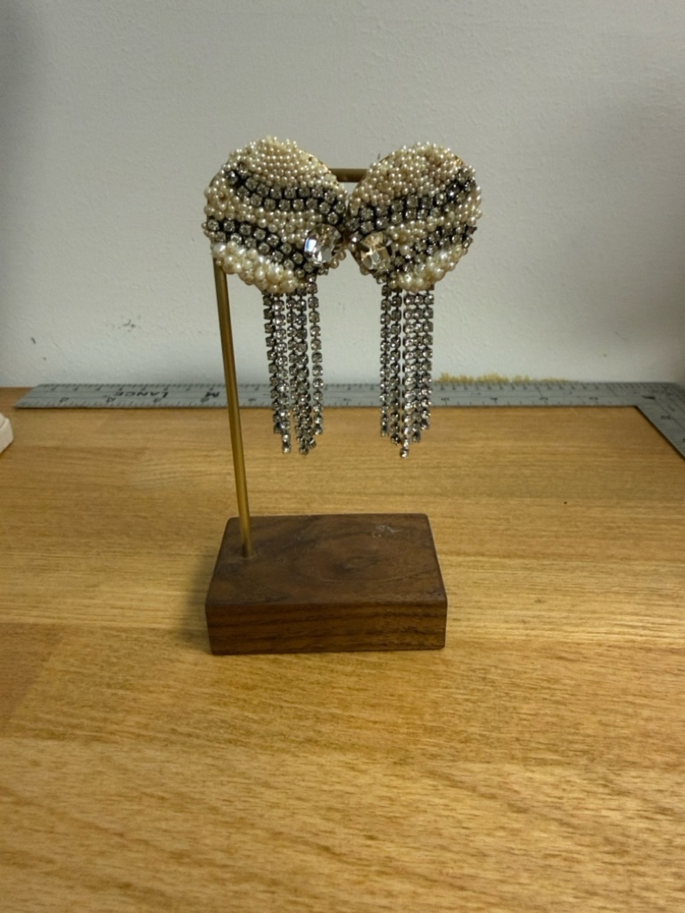 Crystal and faux pearl embellished baseball earrings with tassels clip on